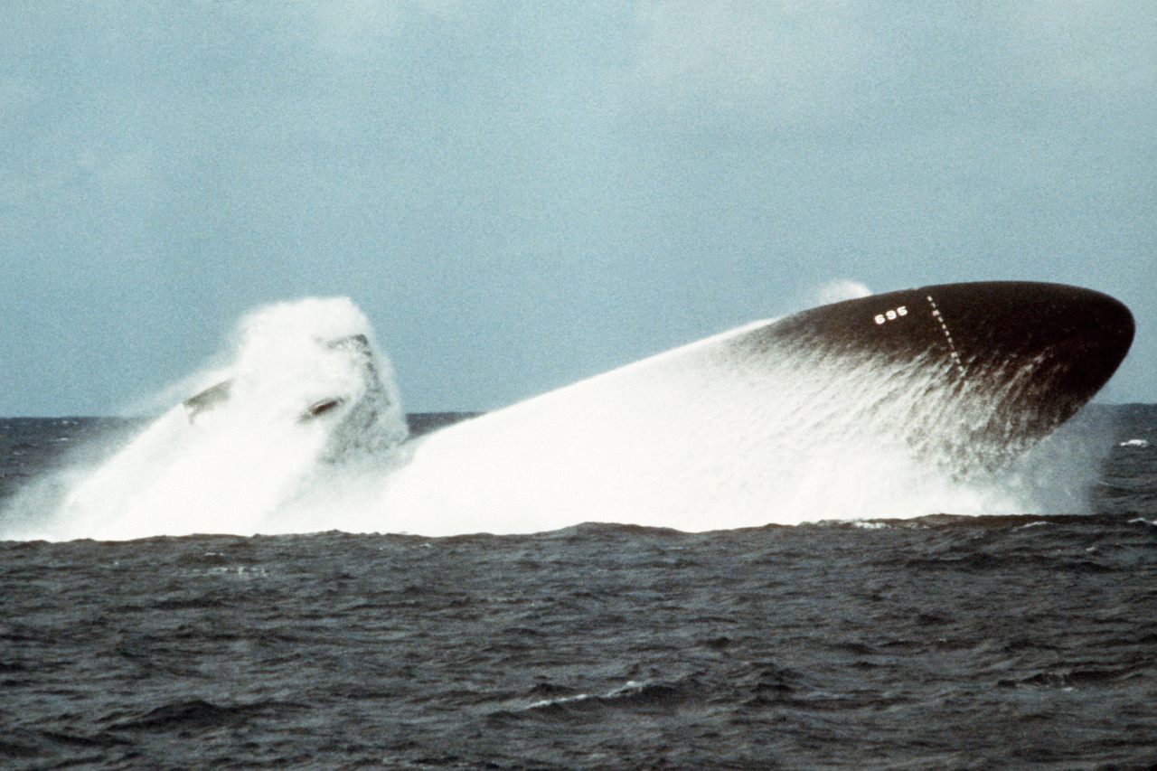 A nuclear-powered submarine conducting a emergency surfacing, 1978
