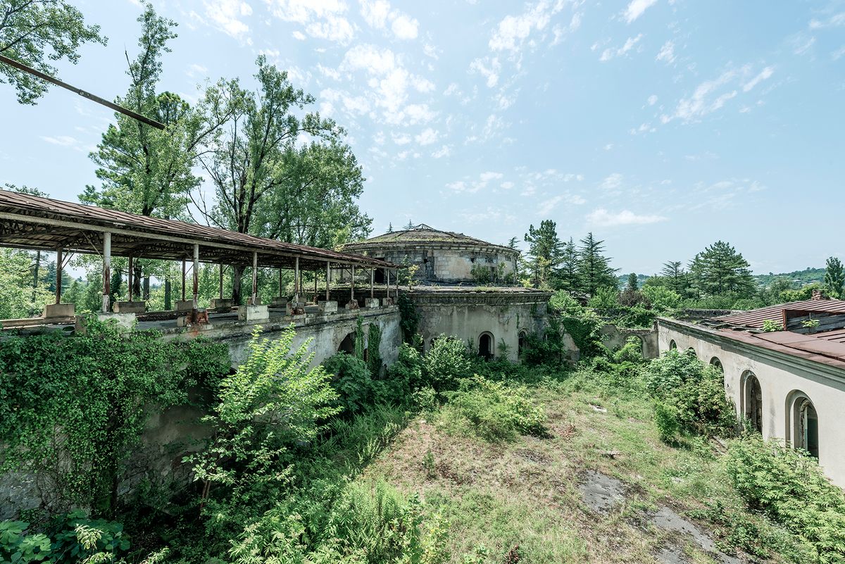 A building that was once used for dining, with an open-air terrace at left, Georgia.