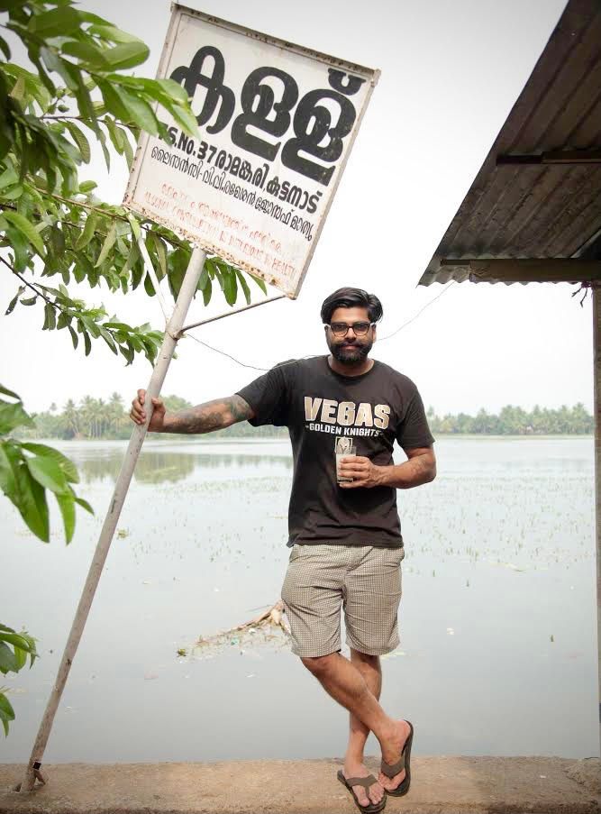 Chef Hemant Kishore, the creator of Las Vegas's pop-up Toddy Shop restaurant, at an actual toddy shop in Kerala, India.