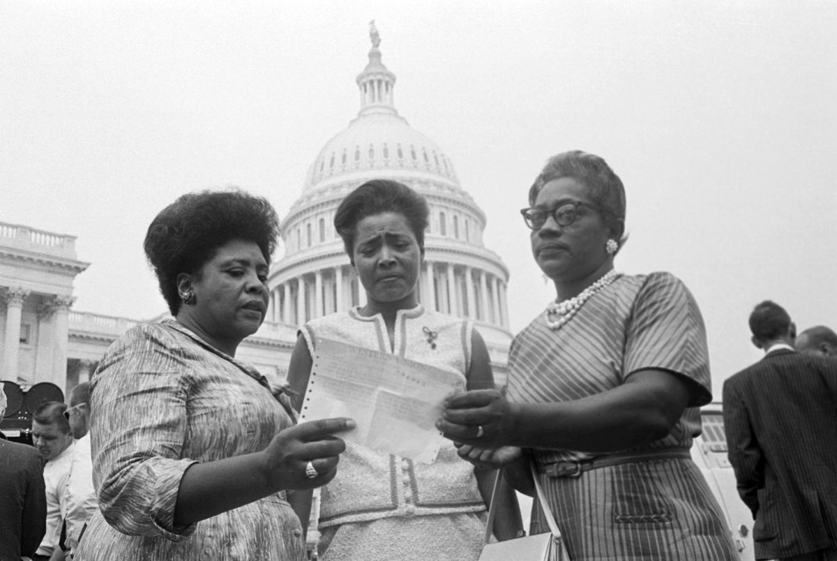 Fannie Lou Hamer (left) attending a Congressional session on a Mississippi election that disenfranchised Black voters.