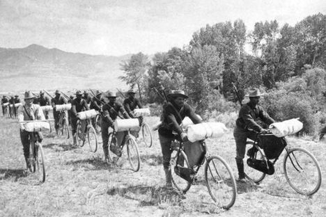 Lt. Moss rides alongside the men of the 25th.