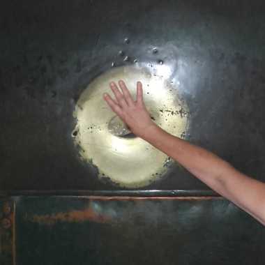 Put your thumb into the hole rotating it and your wish will be fulfilled.