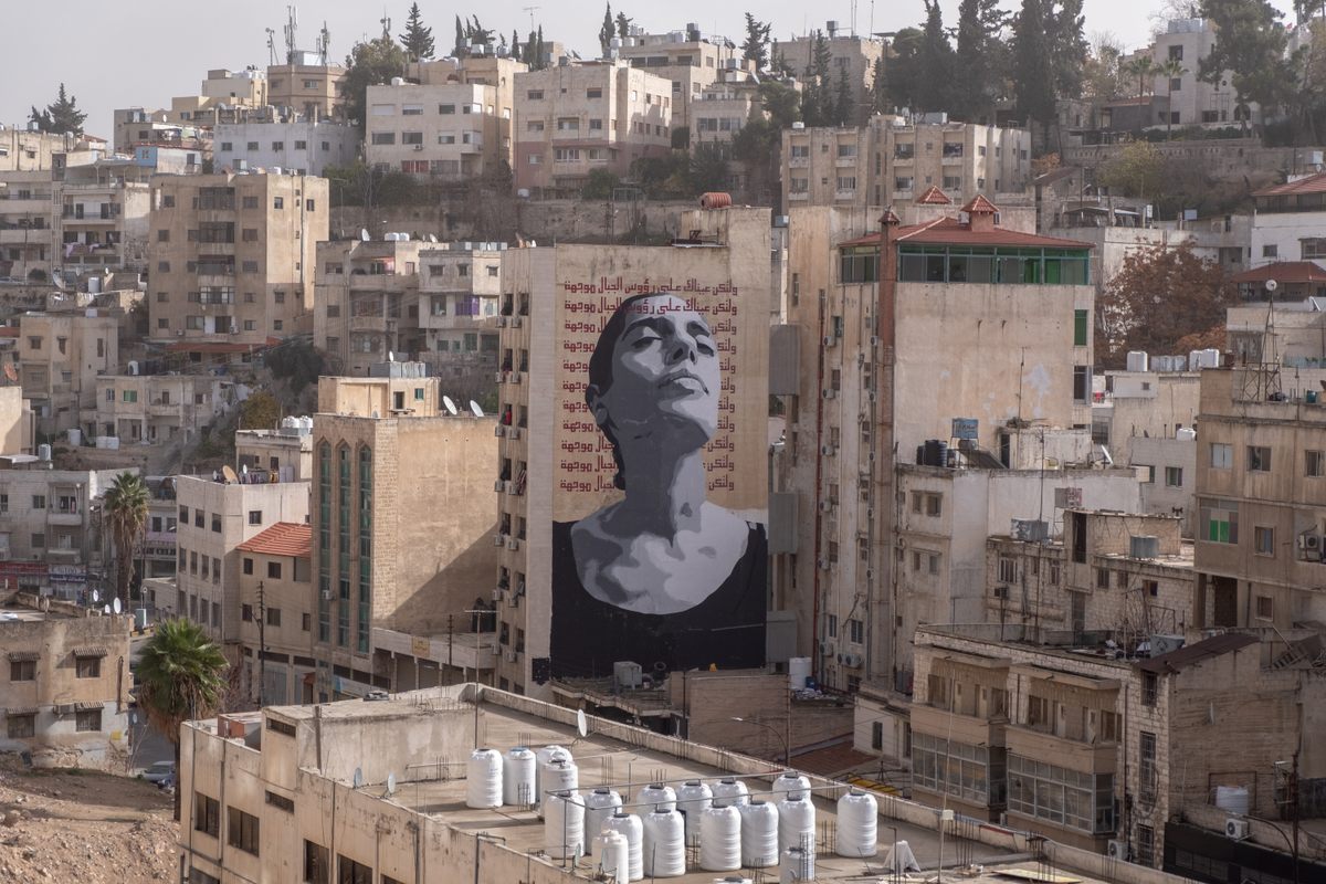 Al Nayyar and Mitwally's eight-story "Breaking the Silence" mural took six weeks to complete.