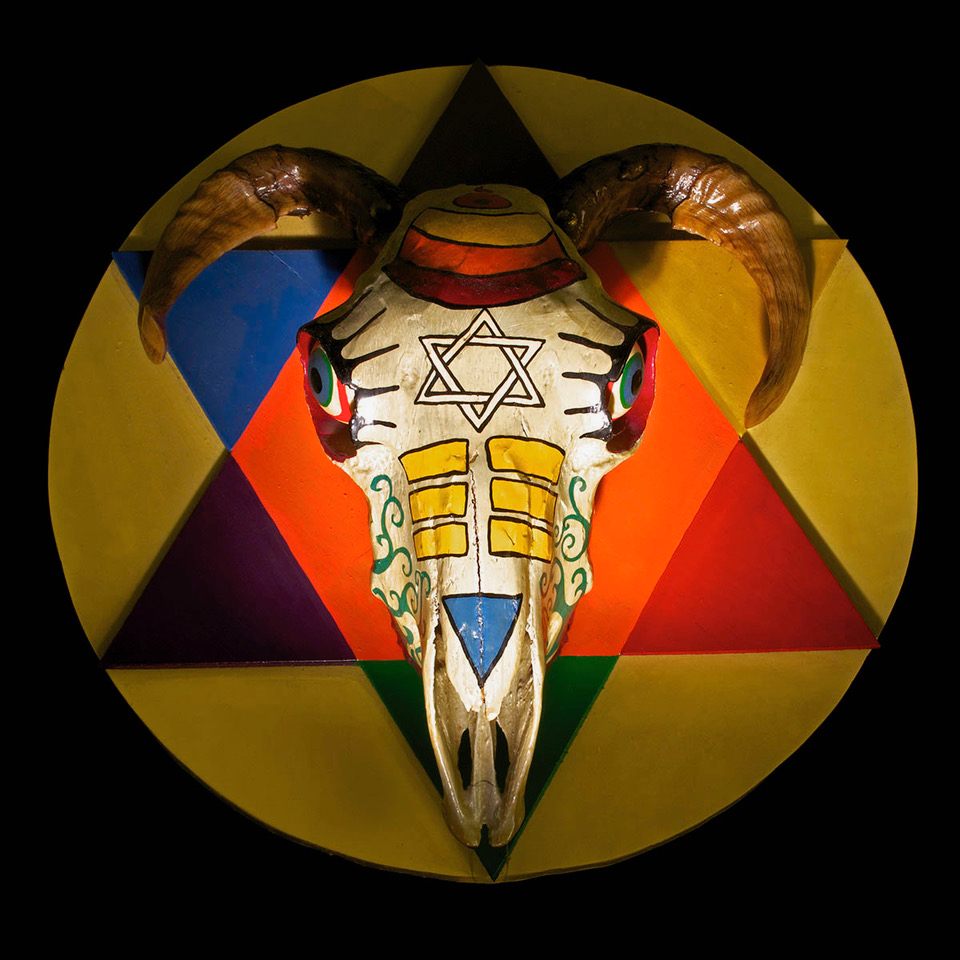 The image from the cover of Sara Hannant's book <em>Of Shadows: One Hundred Objects from the Museum of Witchcraft and Magic</em>.