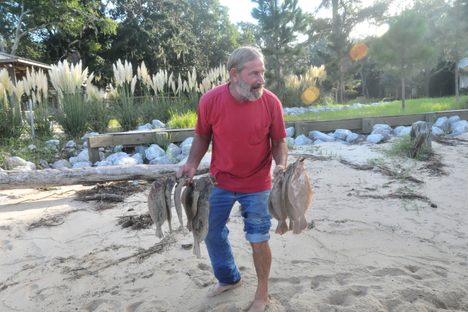 A man with his catch during a Point Clear jubilee in 2012.