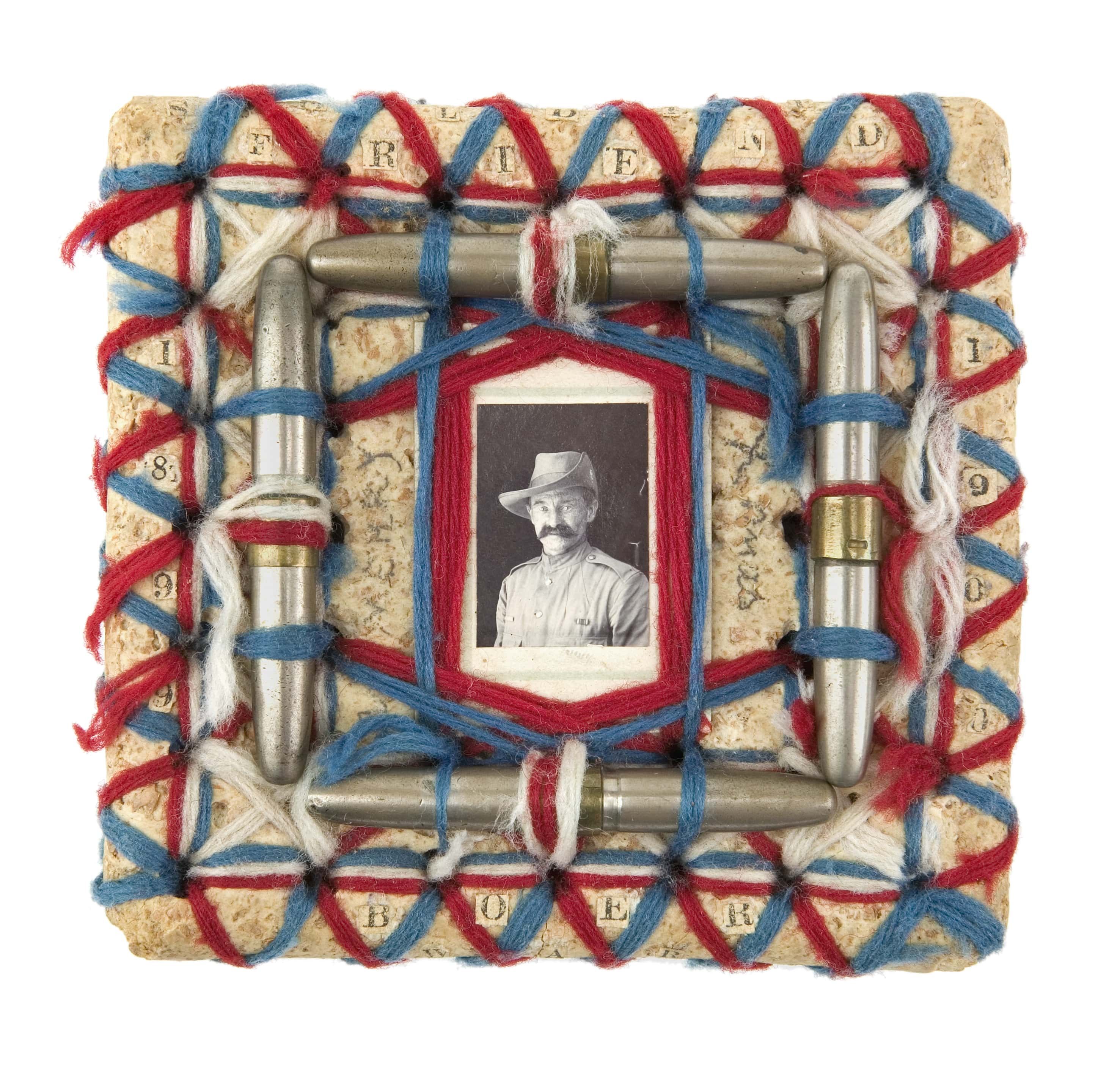 A vibrant, over-the-top card complete with bullet cartridges.