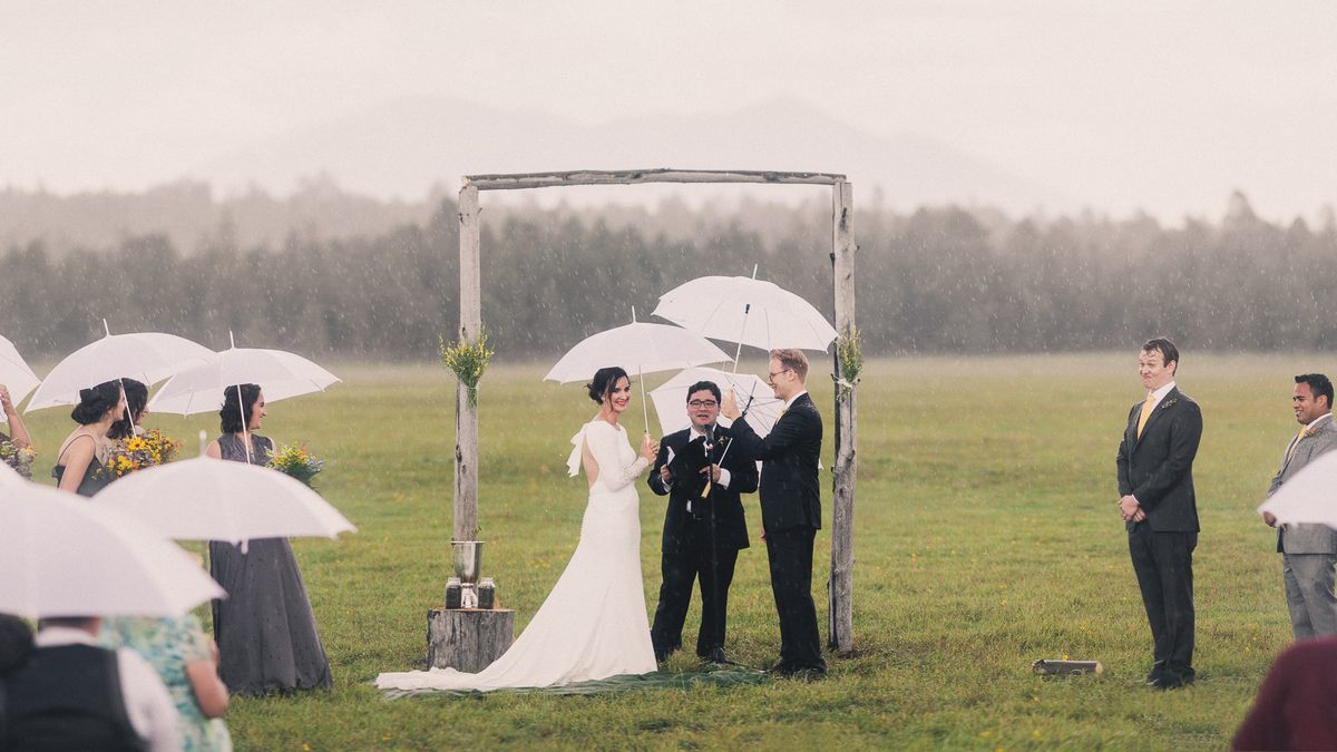 A sudden downpour didn't dampen spirits at this Arizona wedding.