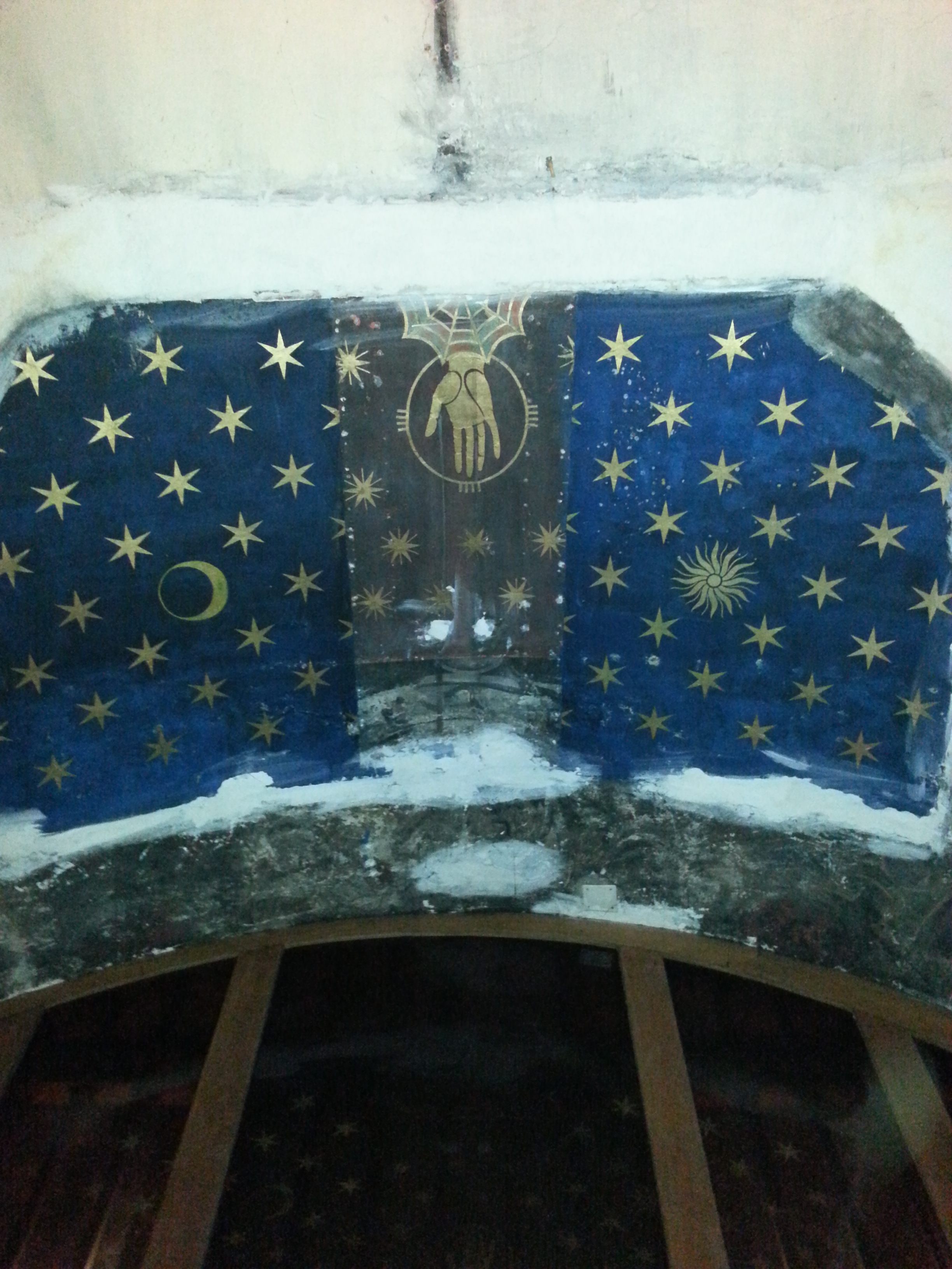 The spiderweb on the ceiling of a medieval church in France. 