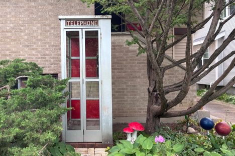 Phone booth, follow the brick road!