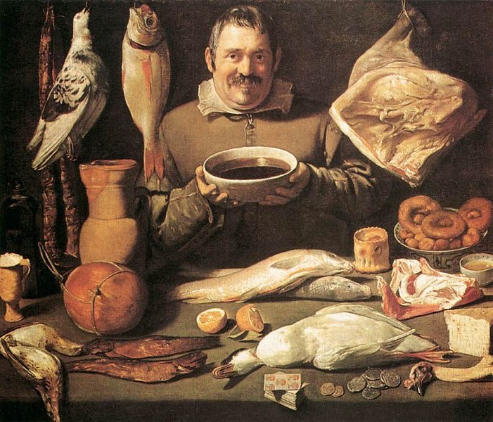 A 17th-century chef surrounded by foods of the day.
