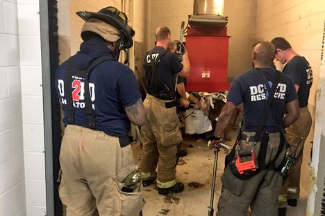 A D.C. Man Fell Into a Trash Chute Because of His Phone