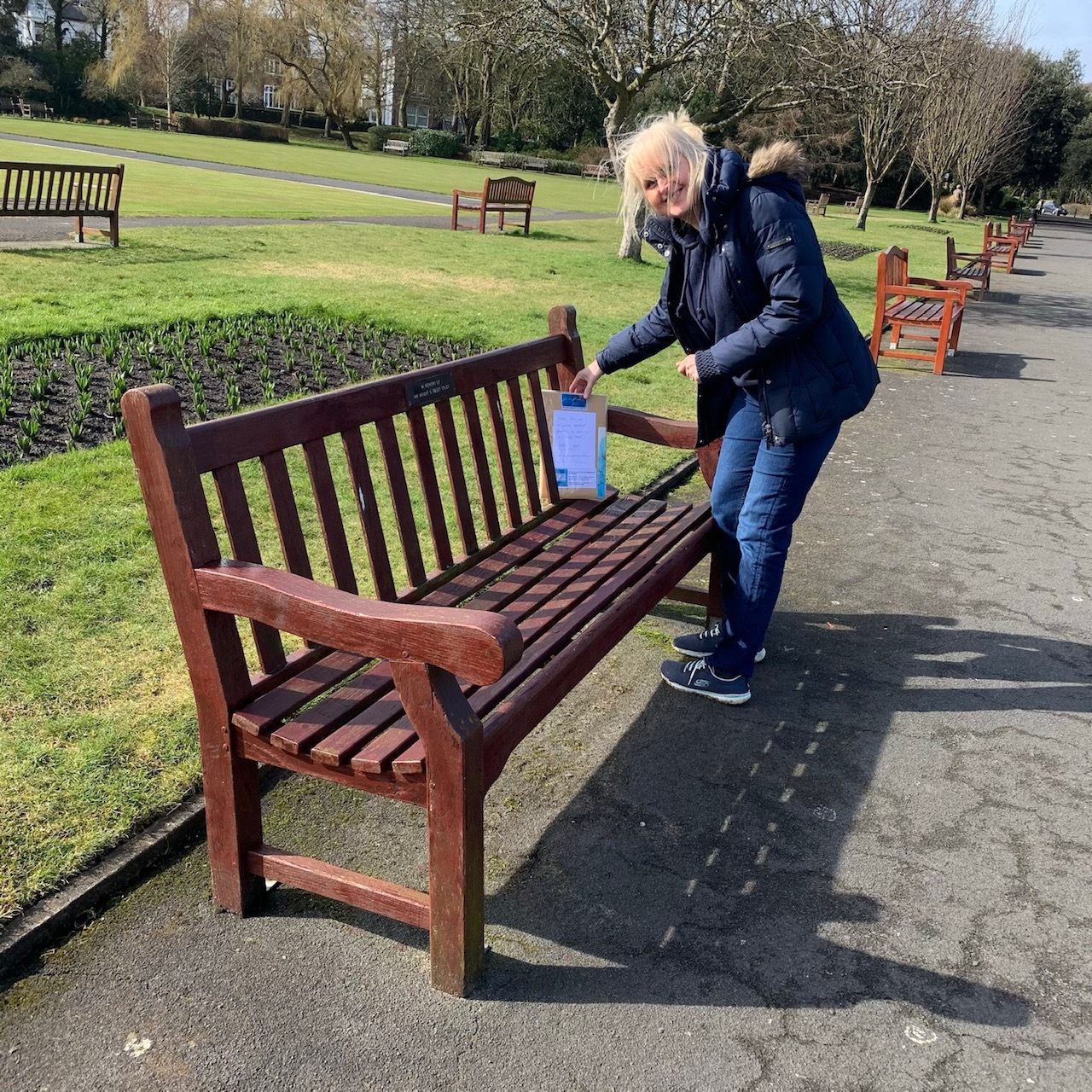 Art and Found Day founder Courtney Senior advises looking in high traffic places for art. Here, Jo Lonsdale leaves a piece of art in a park in the United Kingdom.