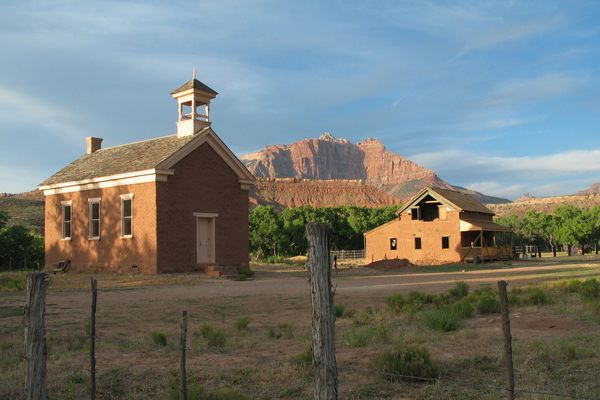 Two of the last remaining buildings of Grafton, Utah, a ghost town south of Zion National Park (which you can see in the background). The schoolhouse was built in 1886, it was also used as a church and public meeting place.