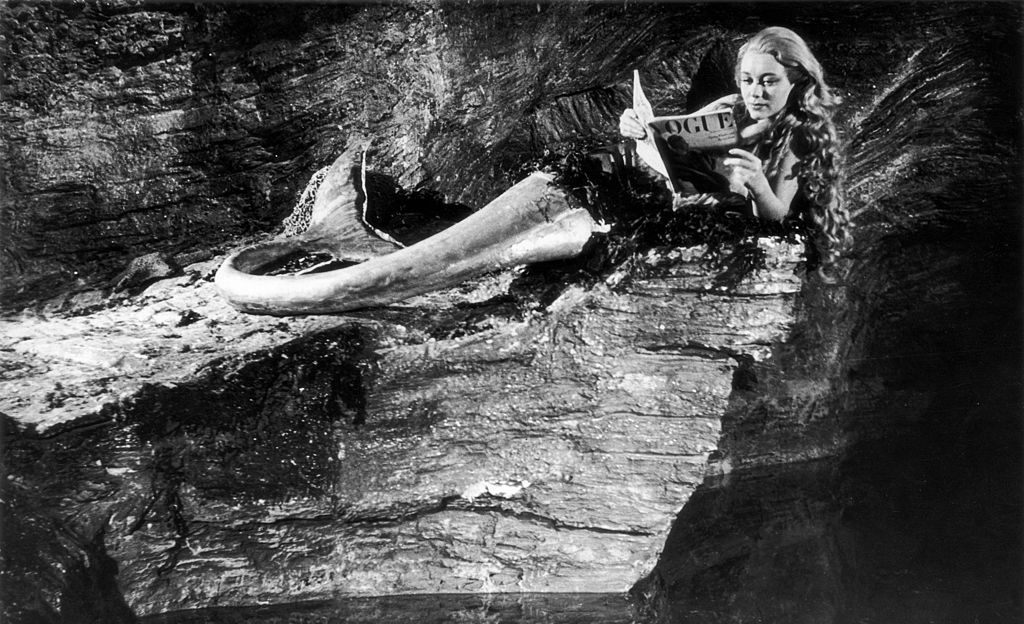 Actress Glynis Johns as Miranda, a mermaid living in a cave.