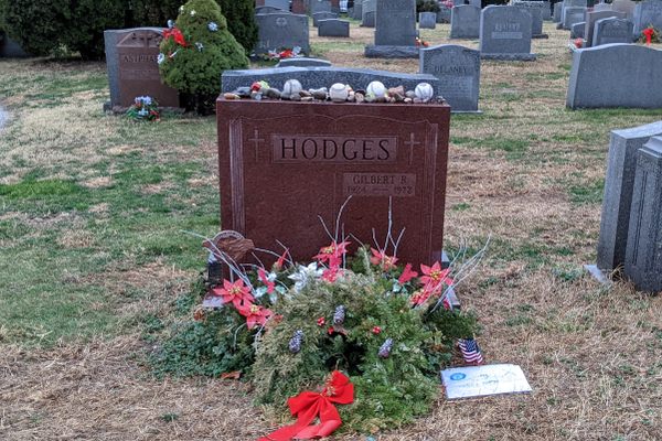 Family members and fans often leave flowers and wreaths at the grave
