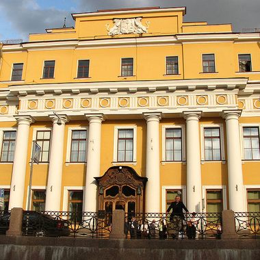 The bright yellow front of Yusupov Palace.