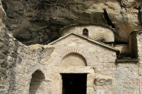 Exterior of the rare, double-church of the Byzantine age built directly into the front of the cave.