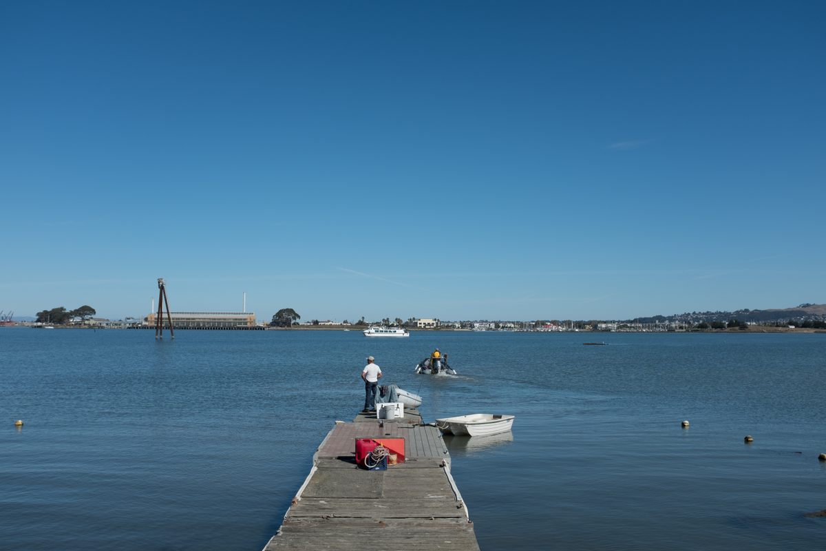 Standin' on the dock of the bay.