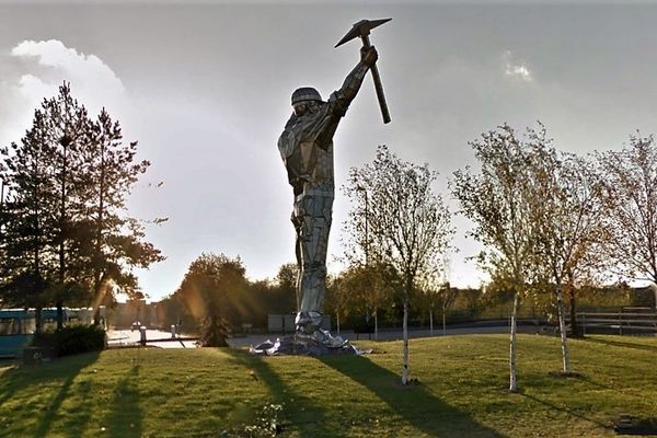 The stainless steel statue is in the middle of the roundabout, in the middle of Brownhills