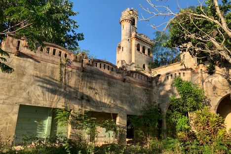 The grand exterior of the mansion.