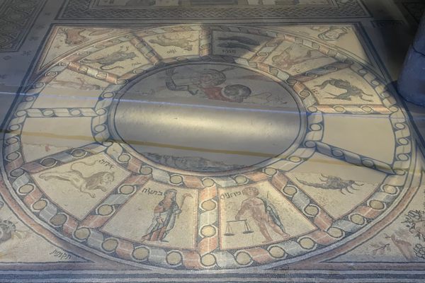 The floor mosaic, with the zodiac in the center and the Torah ark above.