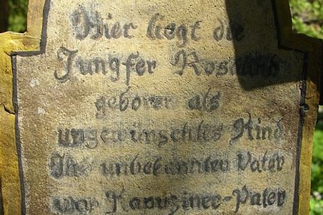"Here lies the virgin Rosalind, born as an unwanted child. Her unknown father was a Capuchin priest."