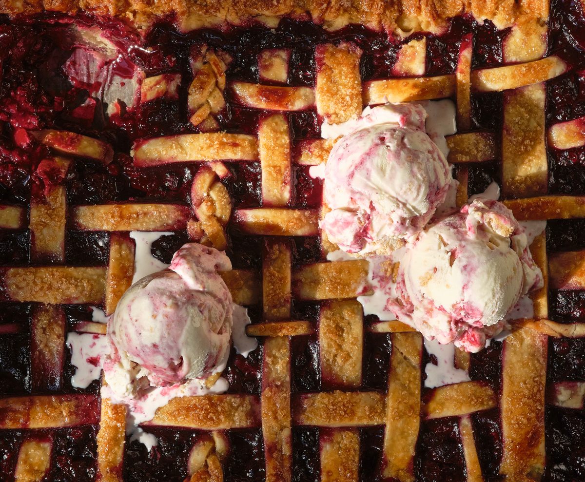 This wild-foraged berry slab pie ice cream has both pie filling and puff pastry bits swirled in.