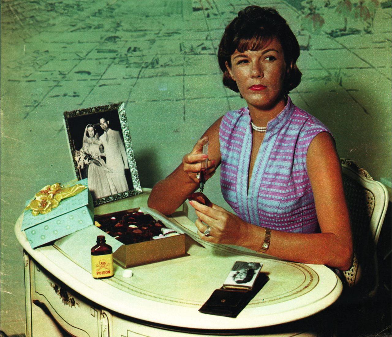 This 1962 cover of <em>Official Detective</em> features a Halloween candy poisoner at work.