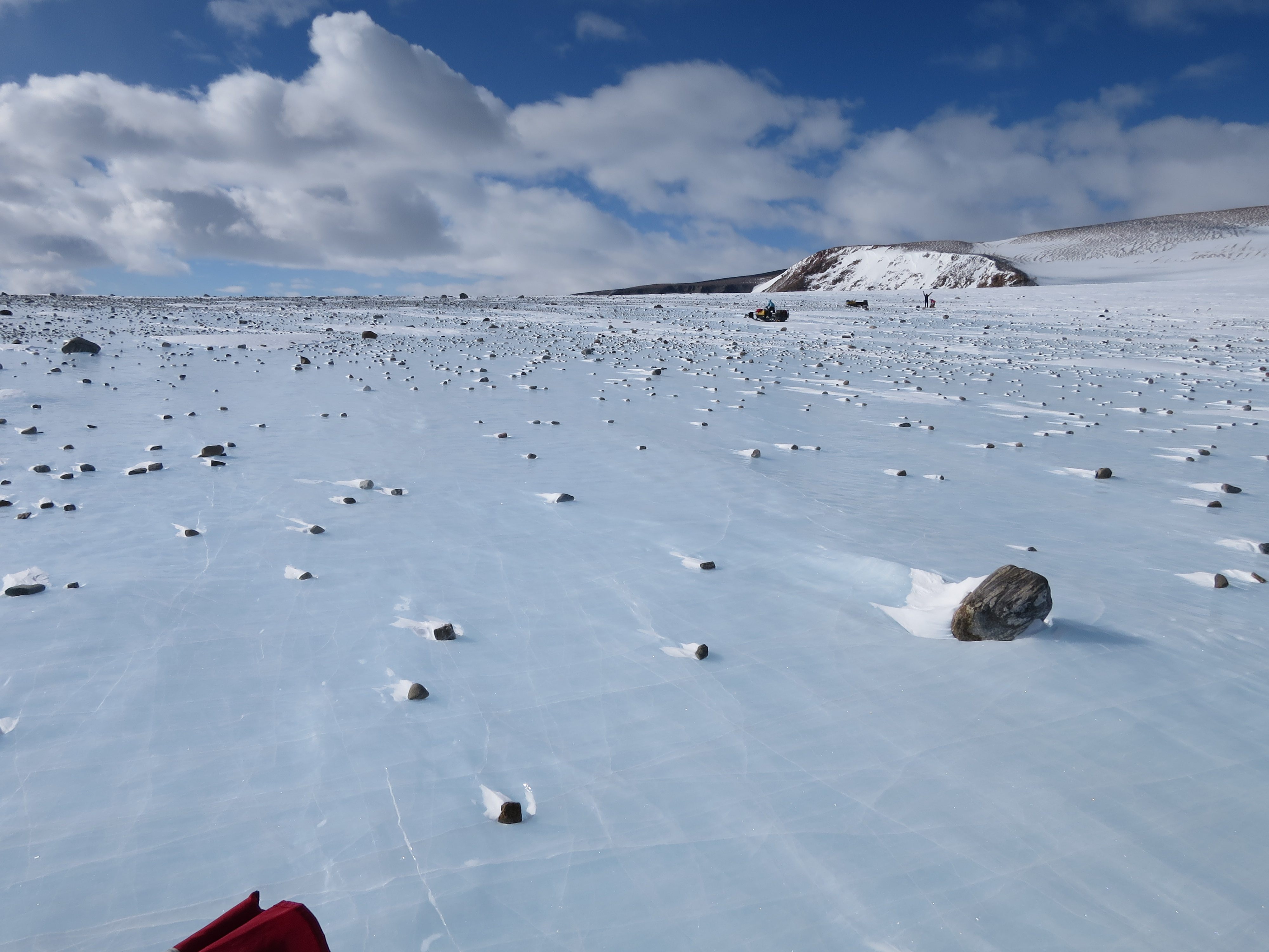 Scientists comb Antarctica for meteorites, which may be in among the other rocks on top of the snow.