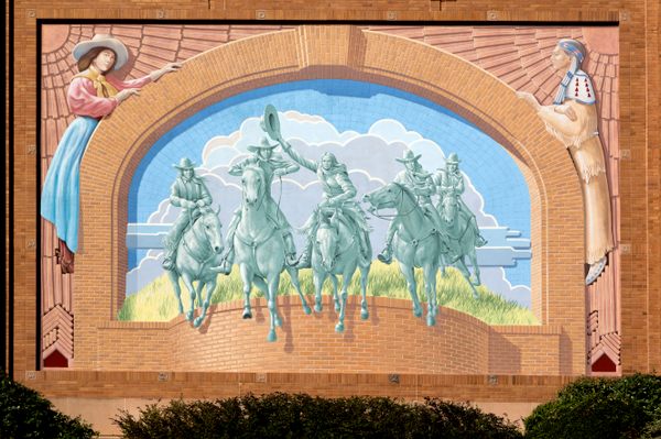 Mural by Richard Haas on the outside of the Cowgirl Hall of Fame