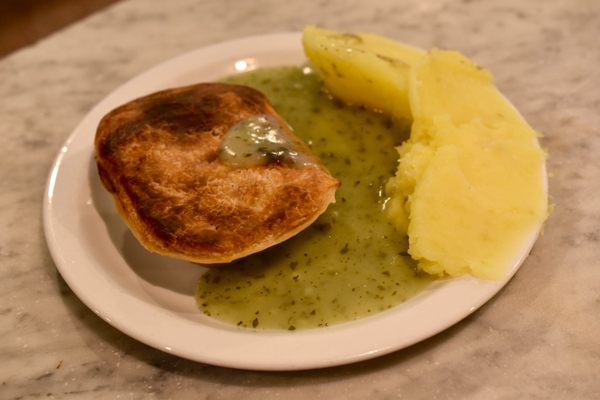 Pie and mash comes with the traditional parsley liquor.