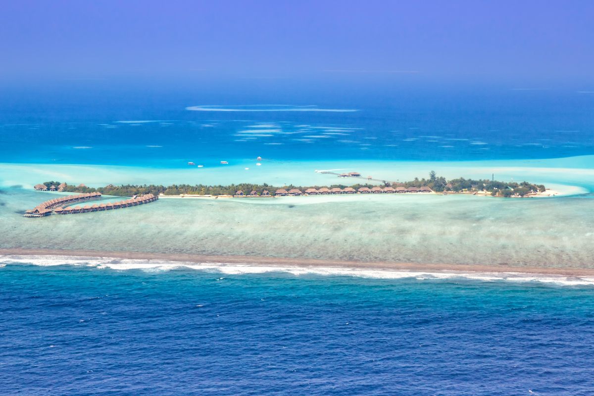 The Taj Exotica Resort & Spa, on Emboodhu Finolhu Island in the Maldives, is advertised as a private island getaway. Some of its villas are built directly over the water.