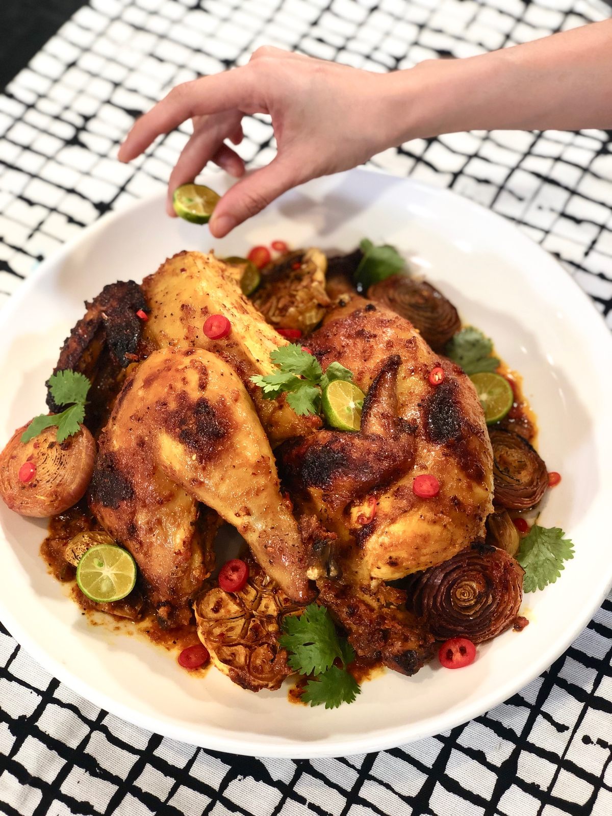 Cooking for her parents means Chef Anis Nabilah is getting in touch with her Malaysian roots, as seen in this <em>Ayam golek</em>.