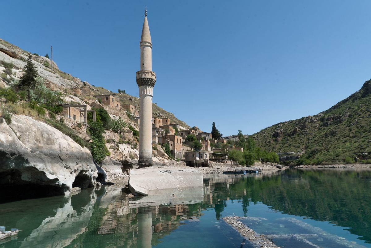 A half-submerged mosque is one of the most striking effects of the Birecik dam.