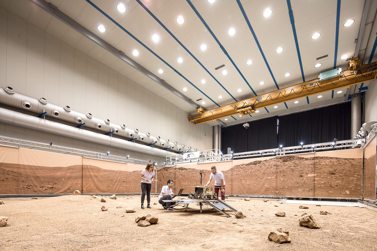 The gantry crane above the Mars Terrain Simulator is used to help simulate low Martian gravity.