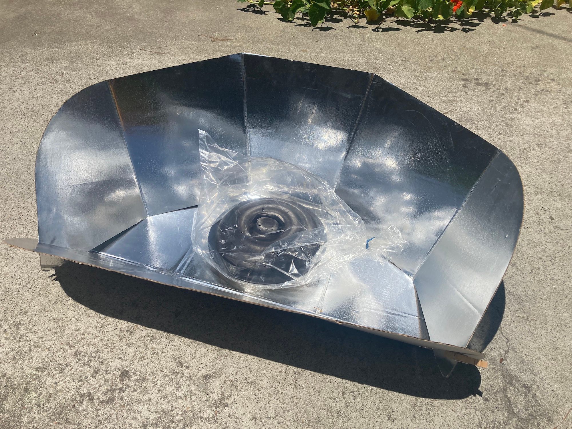 The Cookit is a panel-style cardboard solar cooker.