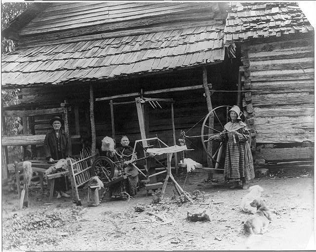 A family outside their cabin in the Appalachian Mountains, where salt-rising bread is said to have originated.