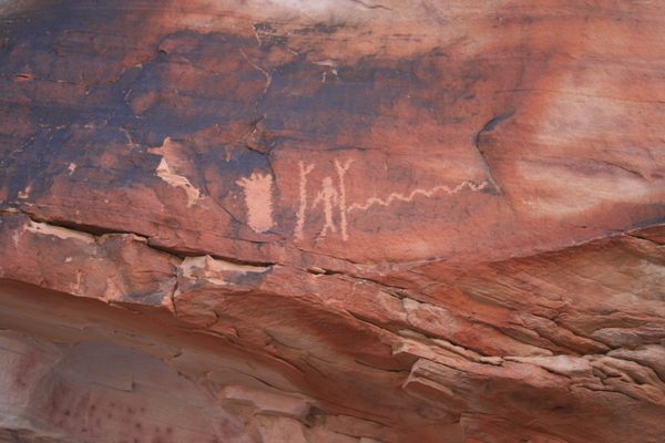 Big Foot petroglyph, with standing figure to right.  The Big Foot is literally a representation of a bare human footprint, not the storied cryptid.
