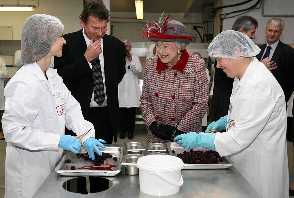 Queen Elizabeth, during a 2010 visit to a jam and pudding factory.