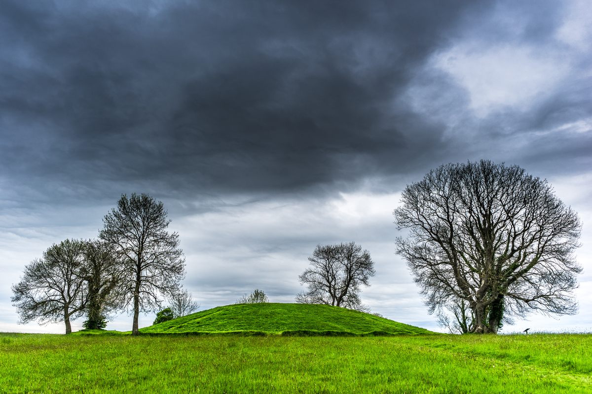 Today, Navan Fort is a distinctive mound in the Irish landscape. Reconstructions of the roundhouse are adjacent to the site.