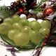 Twelve festive grapes, ready to be eaten.
