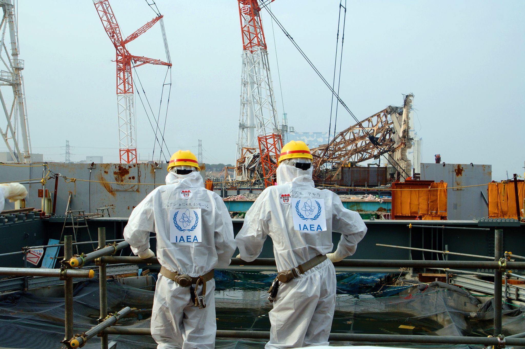 TEPCO workers overlook the Fukushima site in 2013.