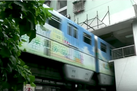 This Rail Line Runs Through the Middle of a 19-Story Apartment Building