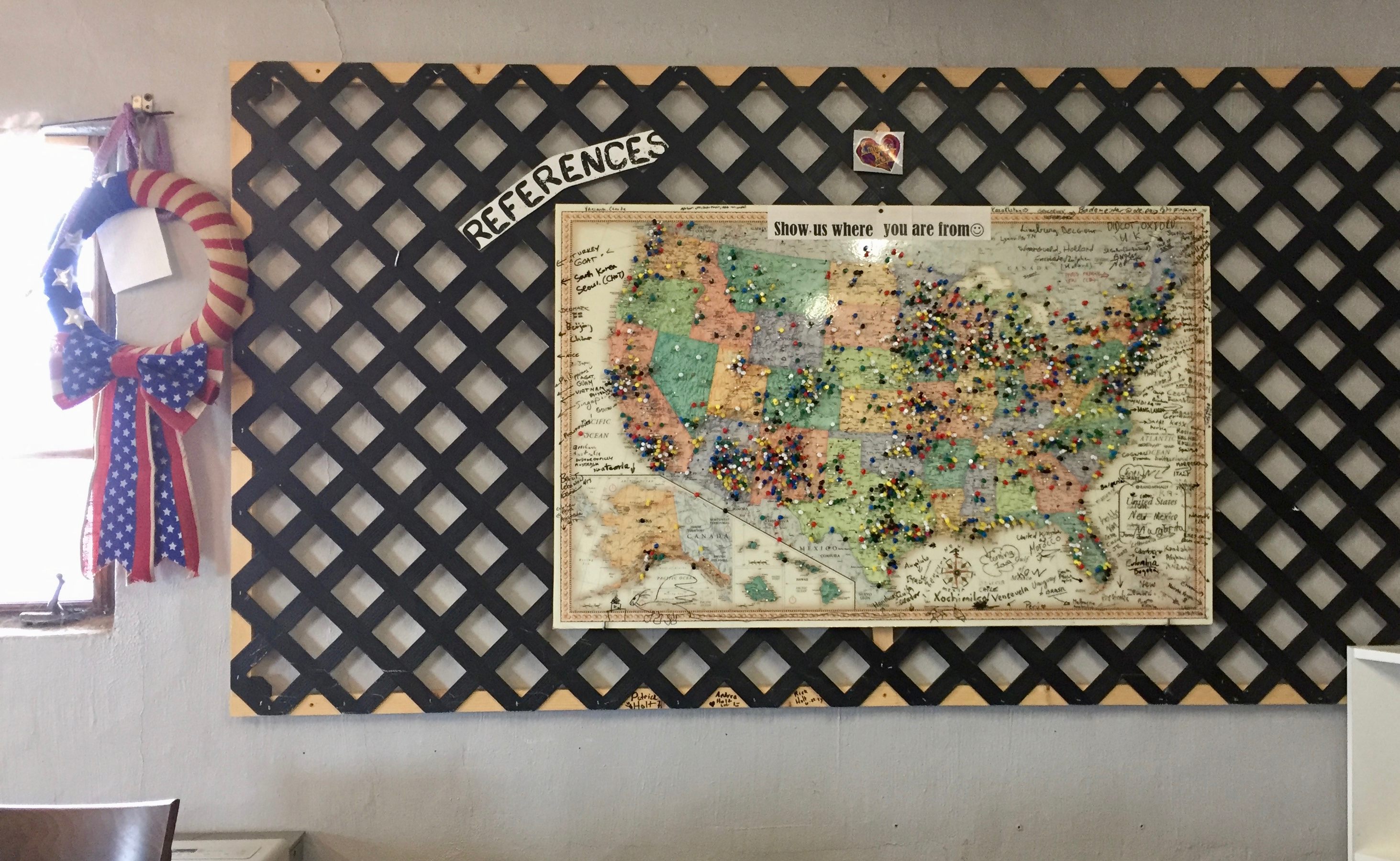 The map in the Gatherin’ Place; each pin represents a visitor's hometown.