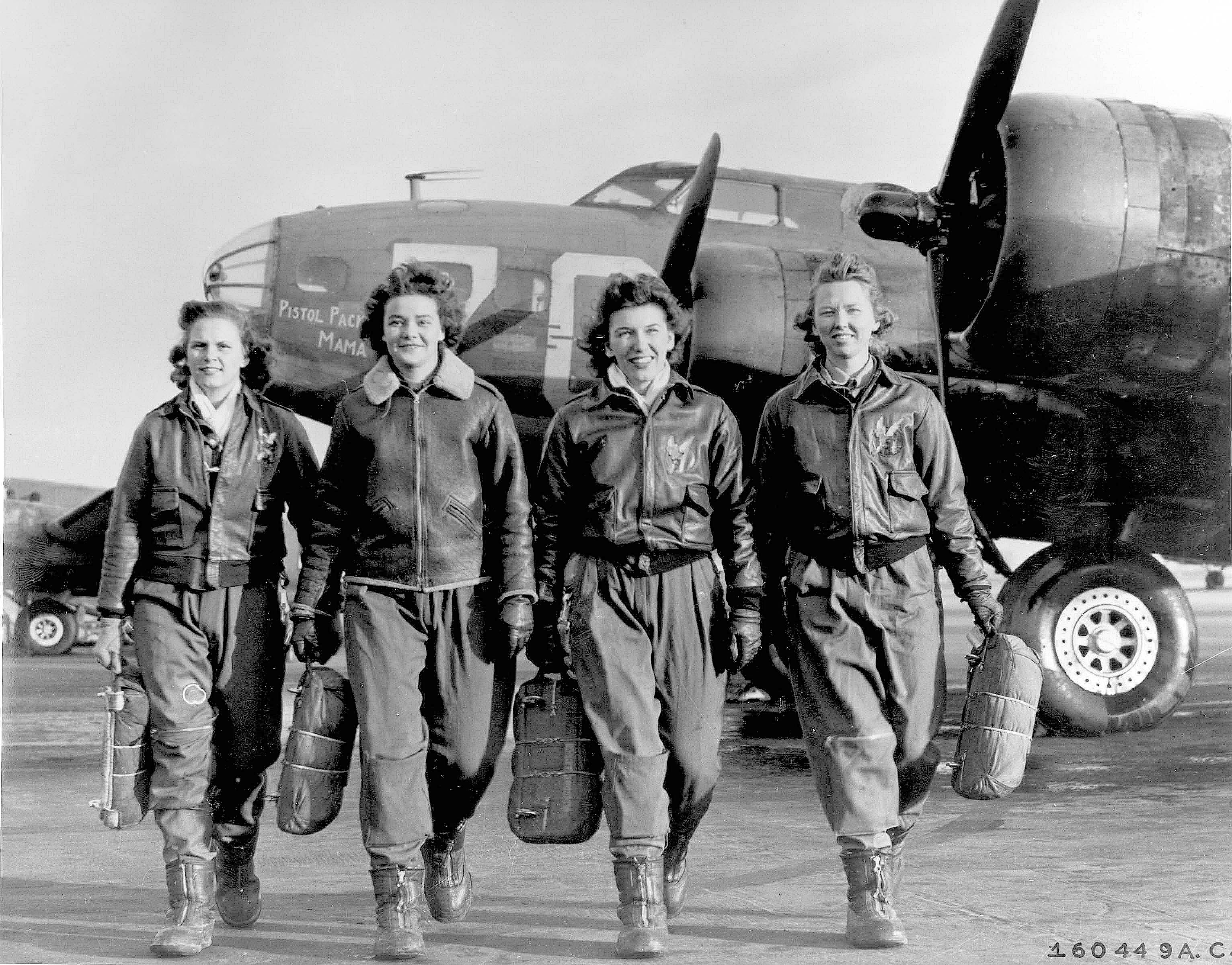 WWII These four female pilots leaving their ship, Pistol Packin' Mama, at the four engine school at Lockbourne AAF, Ohio, are members of a group of Women Airforce Service Pilots (WASPS)