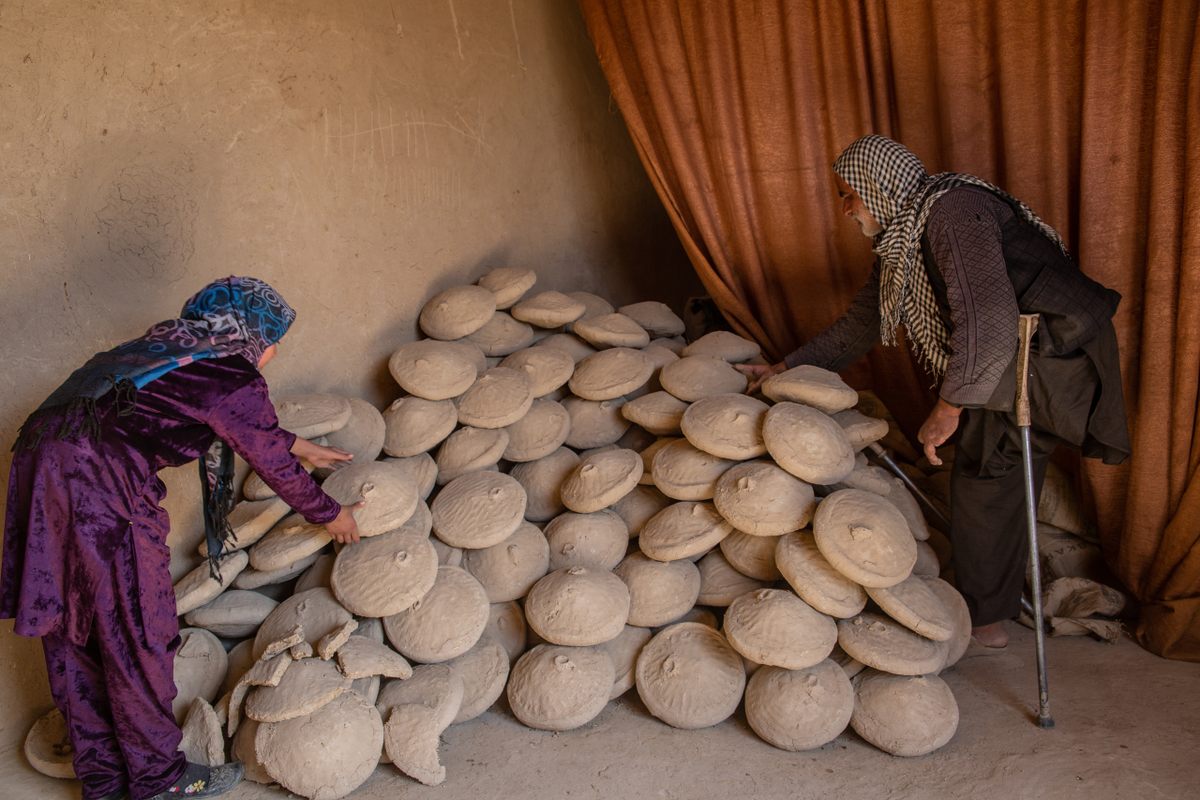 Sabsina shows where the family stores the kangina: in a dry, cold space, away from direct sunlight. 