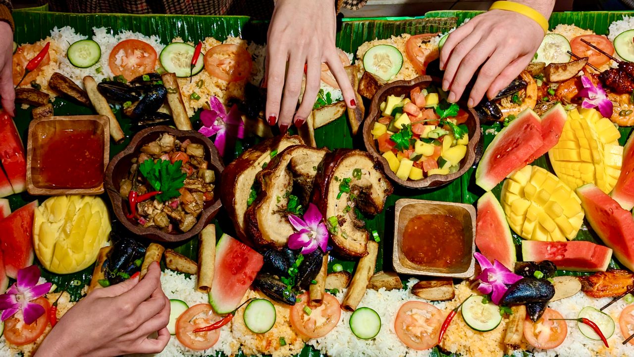 Eating with your hands is an essential part of the kamayan experience.