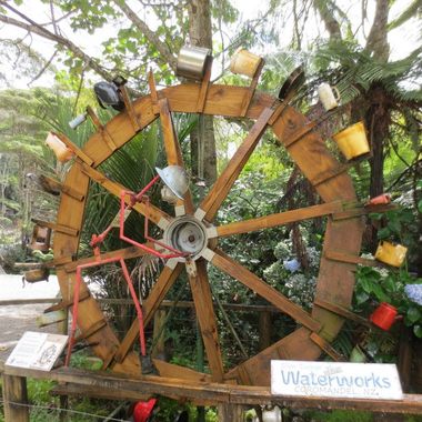 A metal man turns the wheel (which was actually run by water).