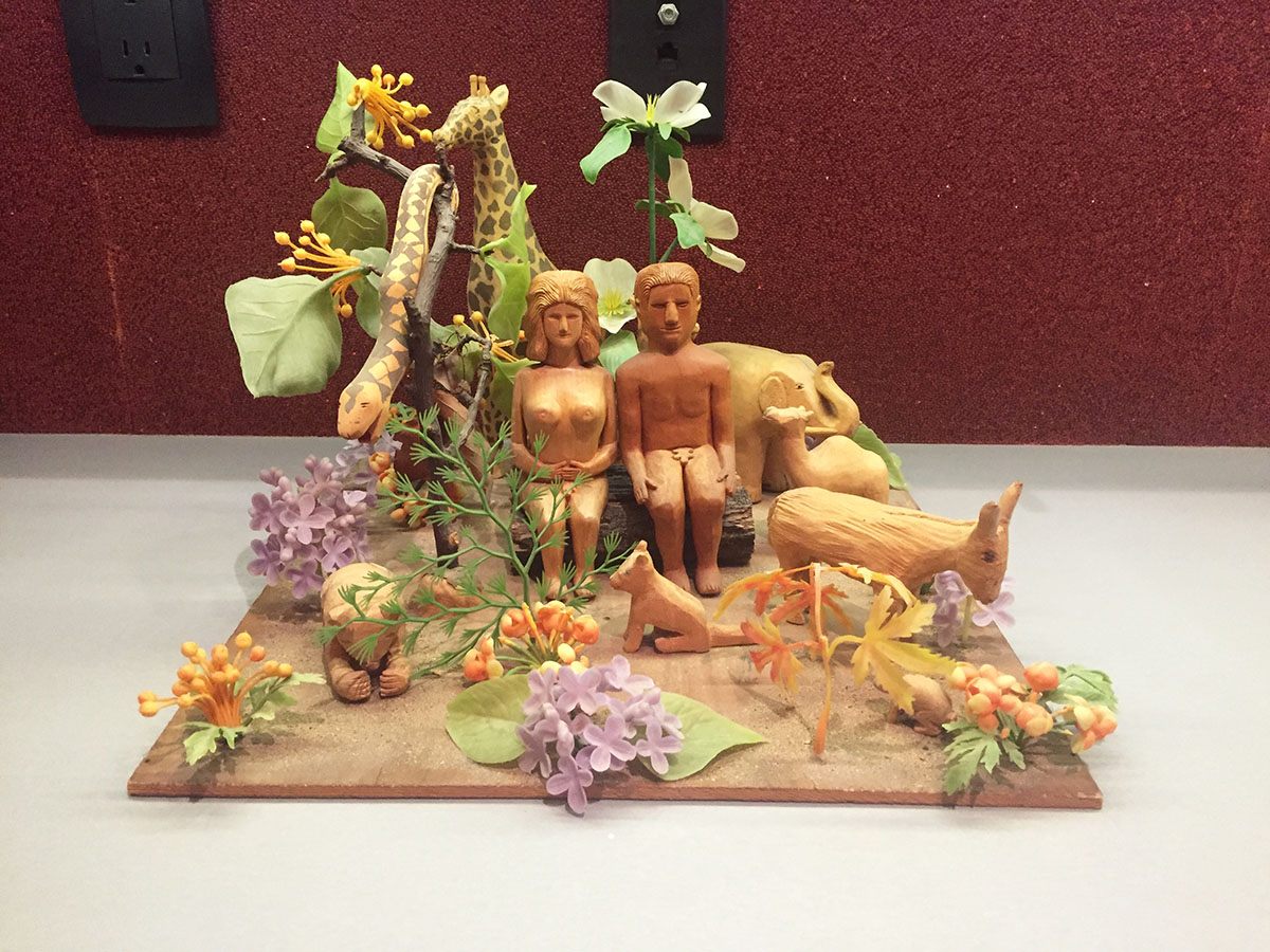 A small, whittled Garden of Eden scene by folk artist Lawrence Stinson. 