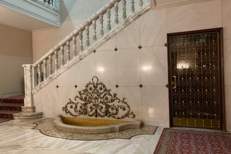 Ascend the grand staircase.